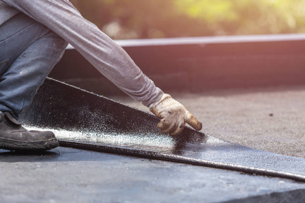 Professional Basement Waterproofing technician working in Johnstown, NY